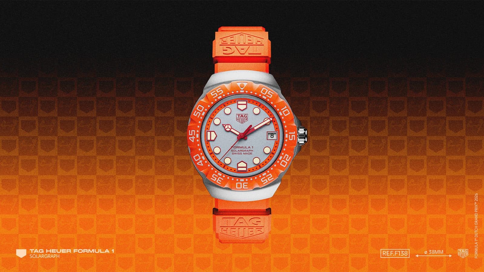 TAG Heuer Formula 1 Solargraph Zandvoort limited edition on an orange rubber strap against an orange background, a 38mm steel case with an orange bezel, grey opaline dial, red accents and a date window at three o'clock