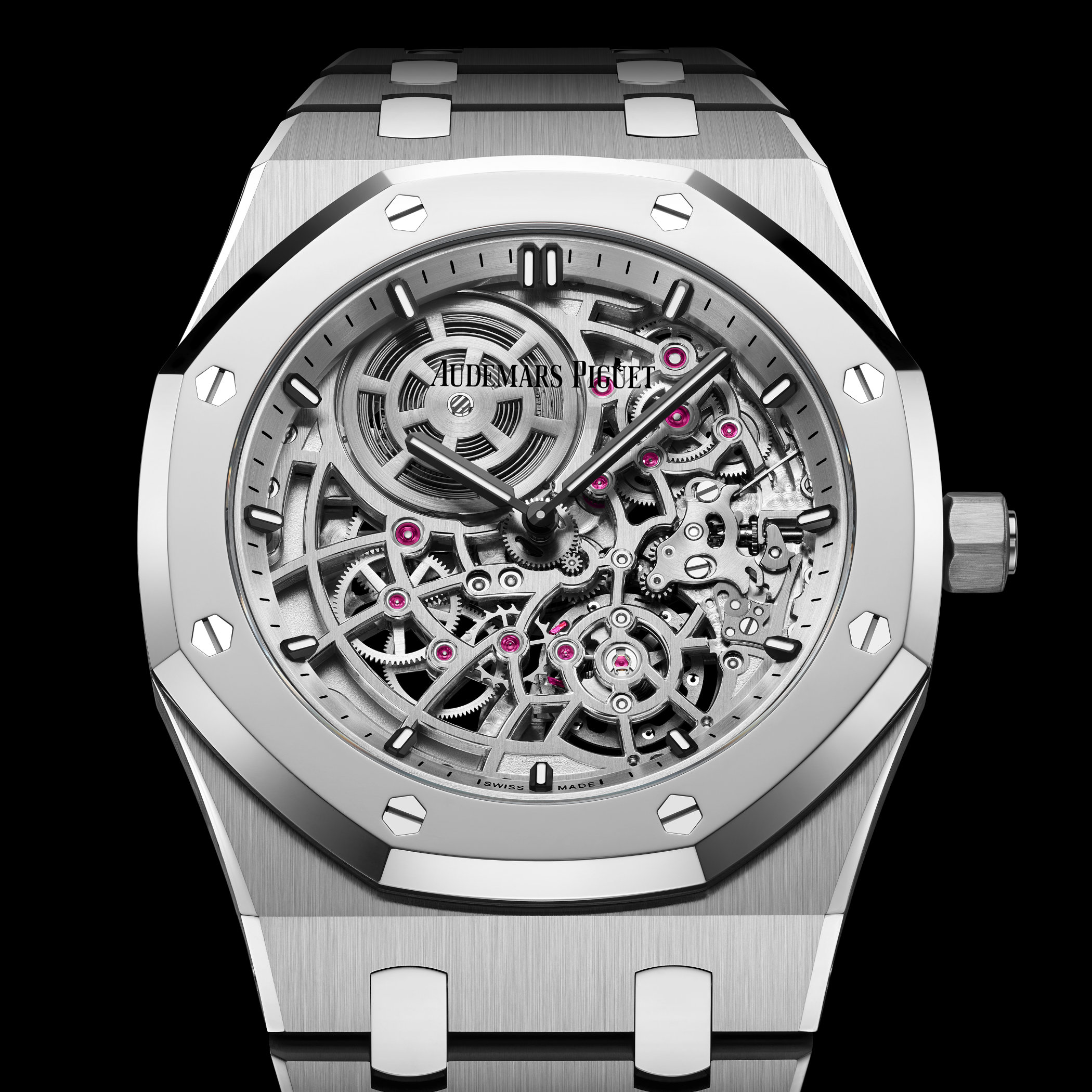 Close-up of the 16204XT dial from above, showing the openworked Calibre 7124 with rhodium-toned bridges, ruby jewels, and the Audemars Piguet signature at twelve