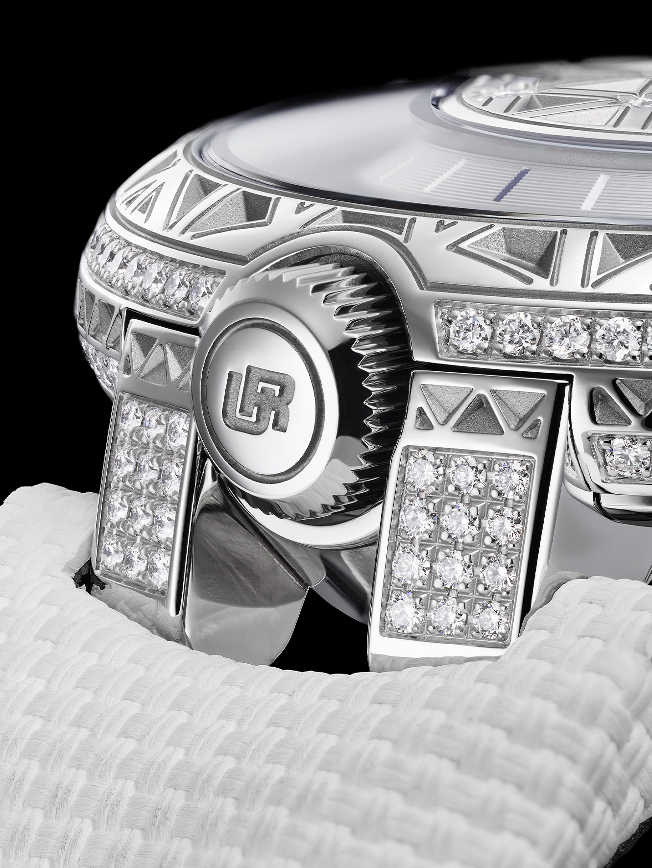 UR-101 Diamond Sky case profile, slim 9.33mm height, diamond-set lugs and pin buckle, white textured rubber strap