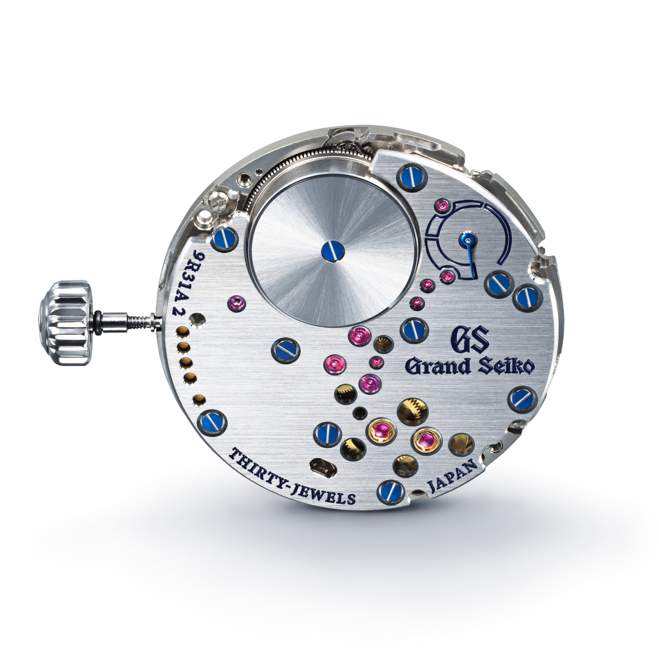 Grand Seiko Calibre 9R31A manual-wind Spring Drive movement shown from the back, with the GS signature, THIRTY-JEWELS and JAPAN engravings, the glide wheel and its regulator visible in the upper right, blued screws, ruby jewels, and the single-barrel twin-mainspring layout