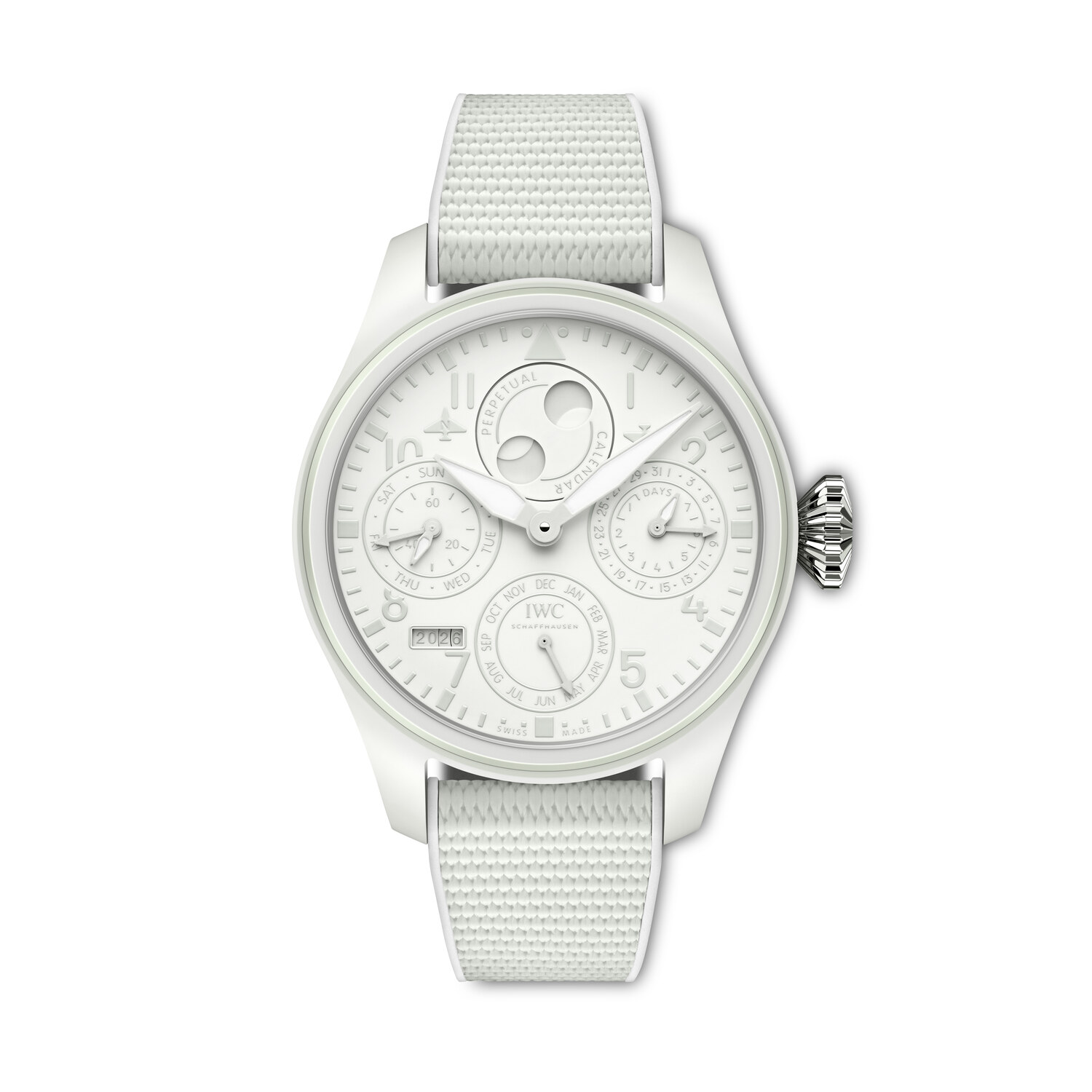 IWC Big Pilot Ceralume in daylight at 3/4 angle, white ceramic case with conical screwed-down crown, white rubber strap, sub-dials for day at 9, date at 3, month at 6 and moon phase at 12