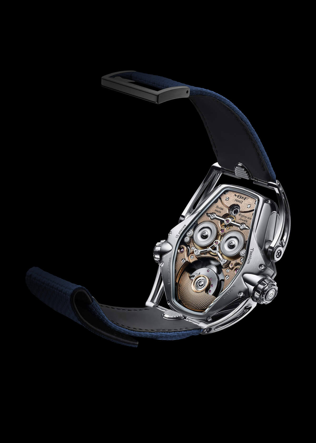 Caseback of the HM12 blue edition showing the in-house calibre, symmetrical bridges, the domed guilloché rotor and the engravings Eighty-six Jewels, Titanium, Limited Edition 12 pieces