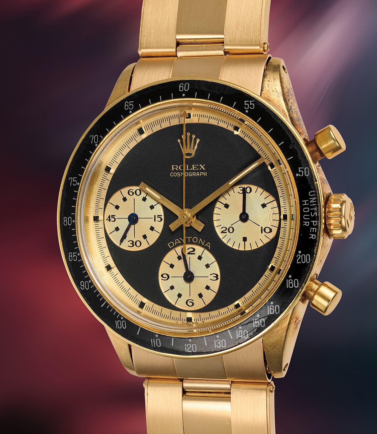 Rolex Cosmograph Daytona reference 6241 'John Player Special' in 18-karat yellow gold, black exotic dial with champagne subdials and the DAYTONA designation above six o'clock, black acrylic bezel, on a yellow gold Oyster bracelet