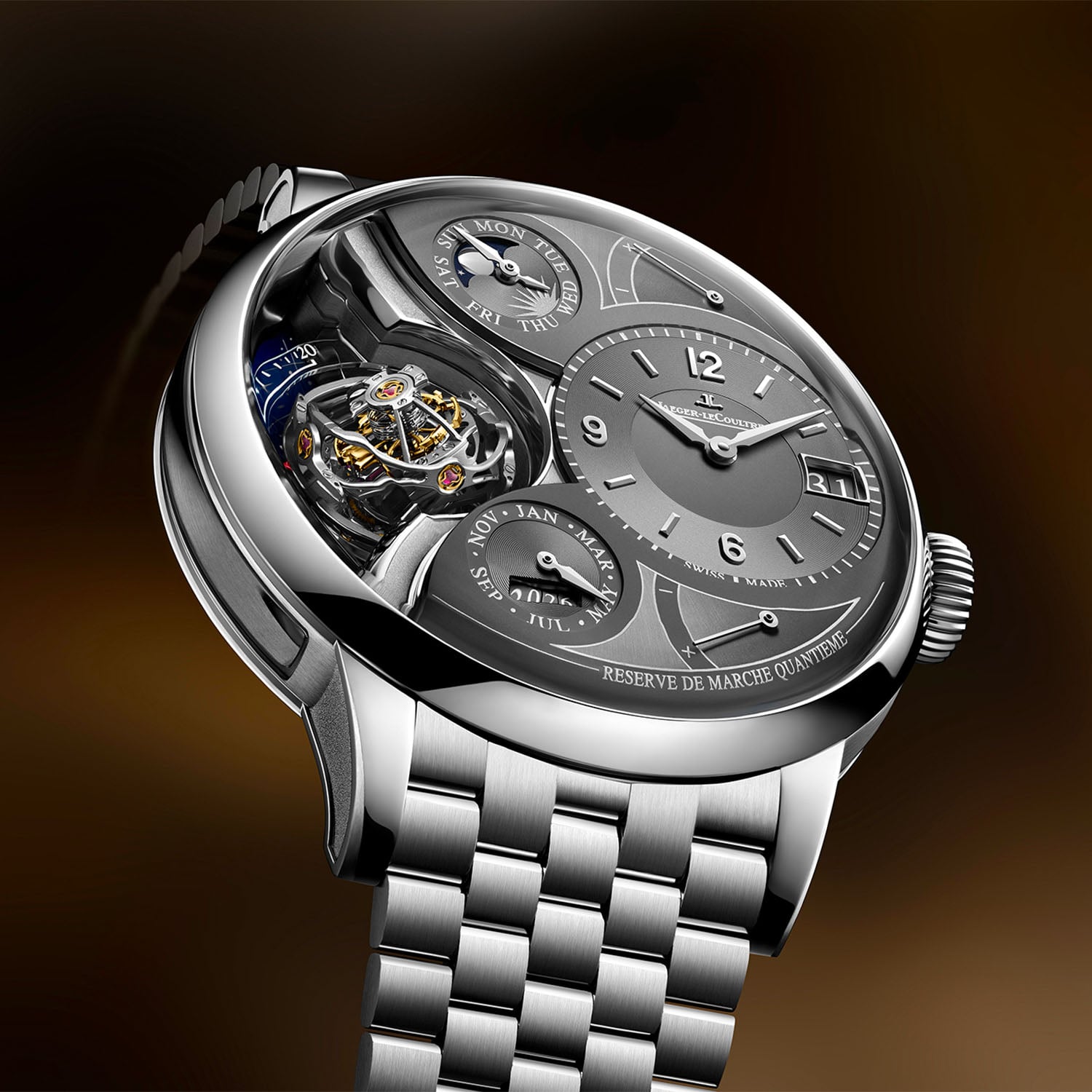 Steeply angled view of the Duometre Heliotourbillon Perpetual showing the domed sapphire, the openworked dial section from seven to eleven o'clock with the triple-axis tourbillon and blue starry background, the grey hours and minutes sub-dial with big date at three, and the platinum bracelet