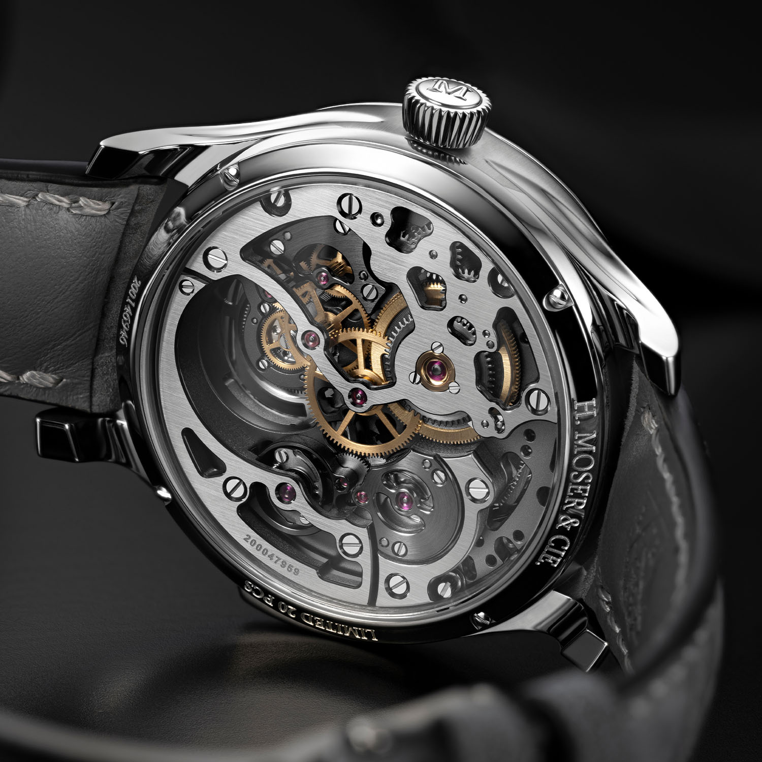 Caseback of the Cosmic Rain showing the skeletonised HMC 909 through sapphire, engraved H. MOSER & CIE. and LIMITED 20 PCS around the rim