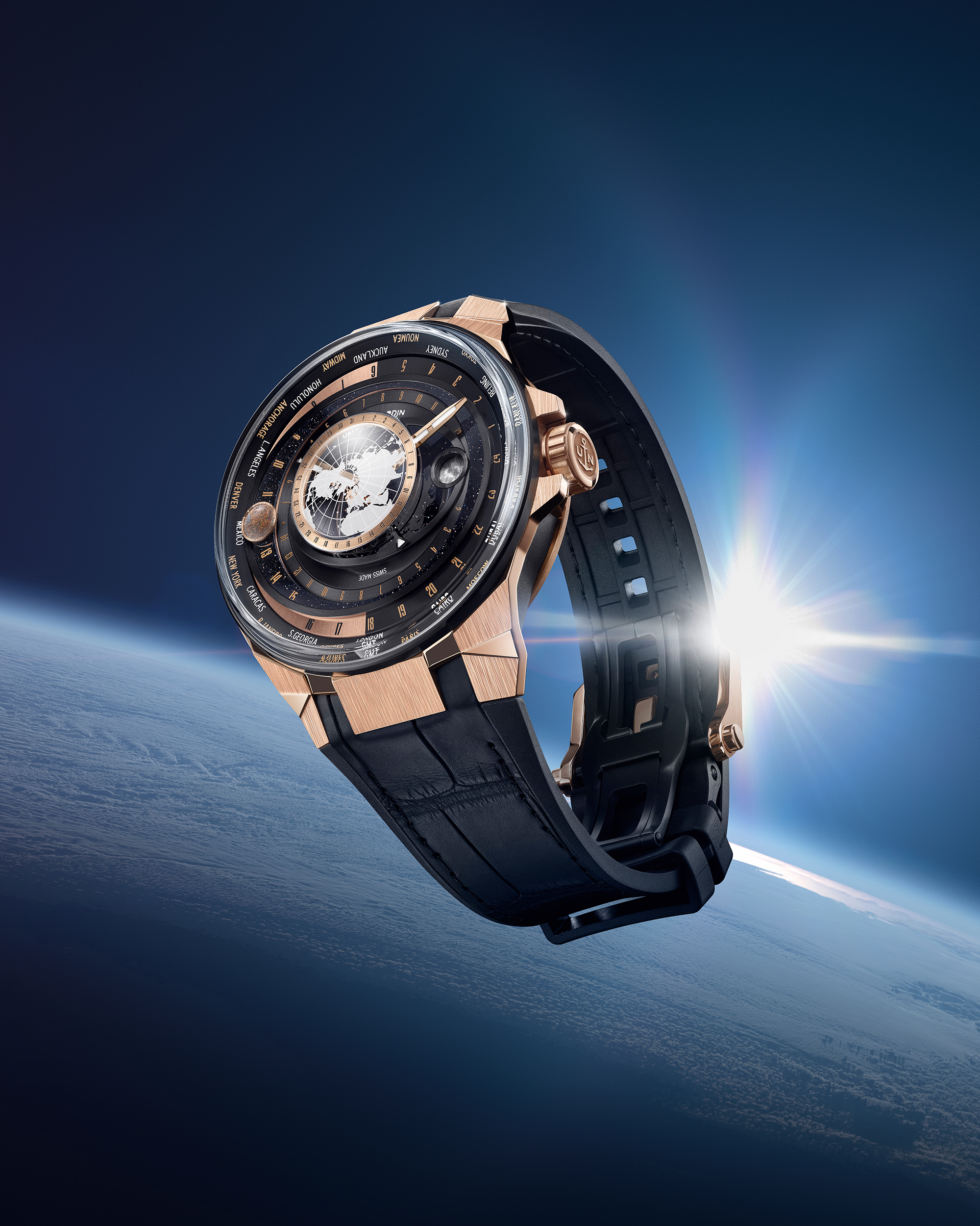 The Blast Moonstruck in three-quarter profile, 18-karat rose gold and black DLC titanium case with the worldtime city ring, on a blue alligator and rubber strap