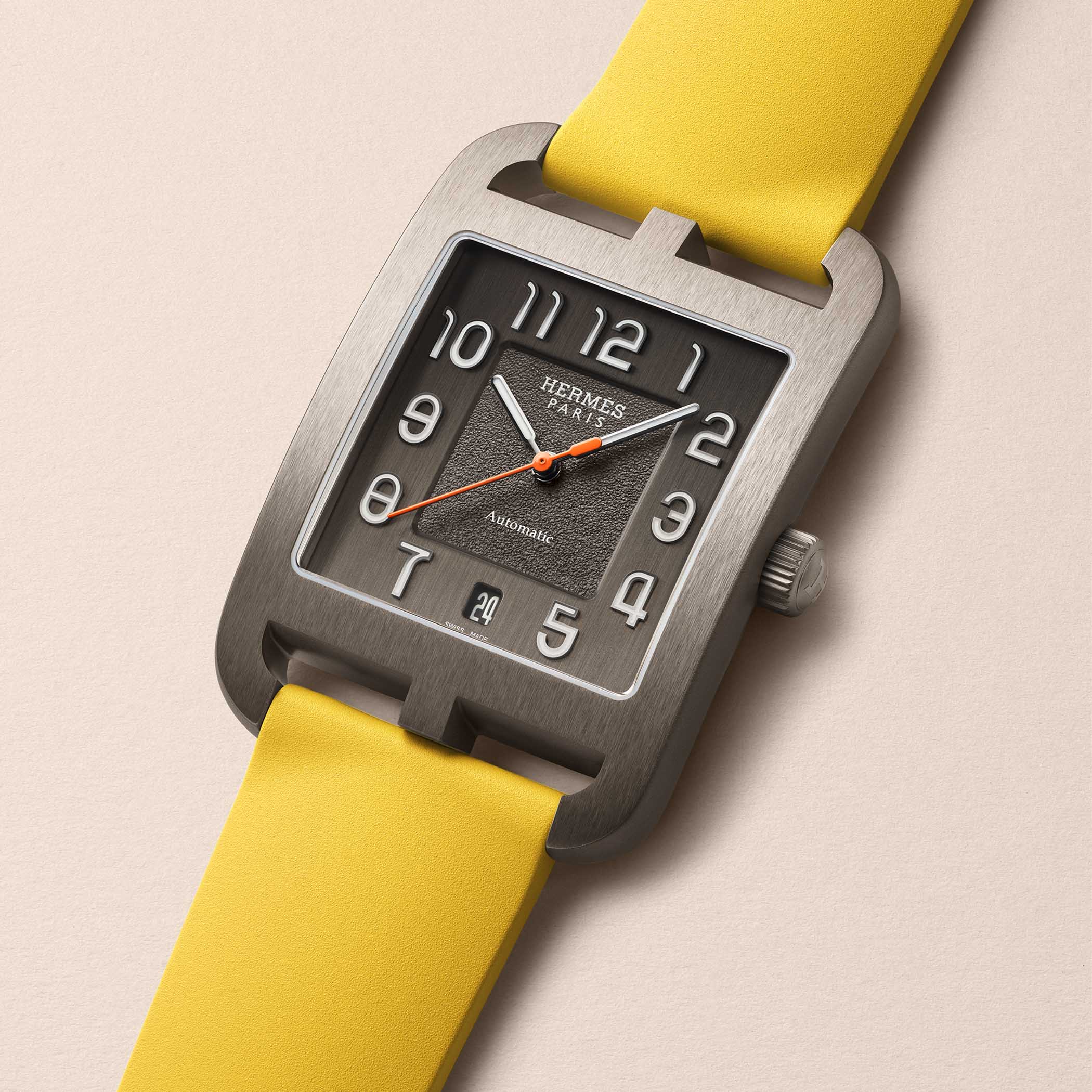 The Cape Cod Titanium on a Jaune de Naples yellow rubber strap, brushed titanium case and dark grey dial