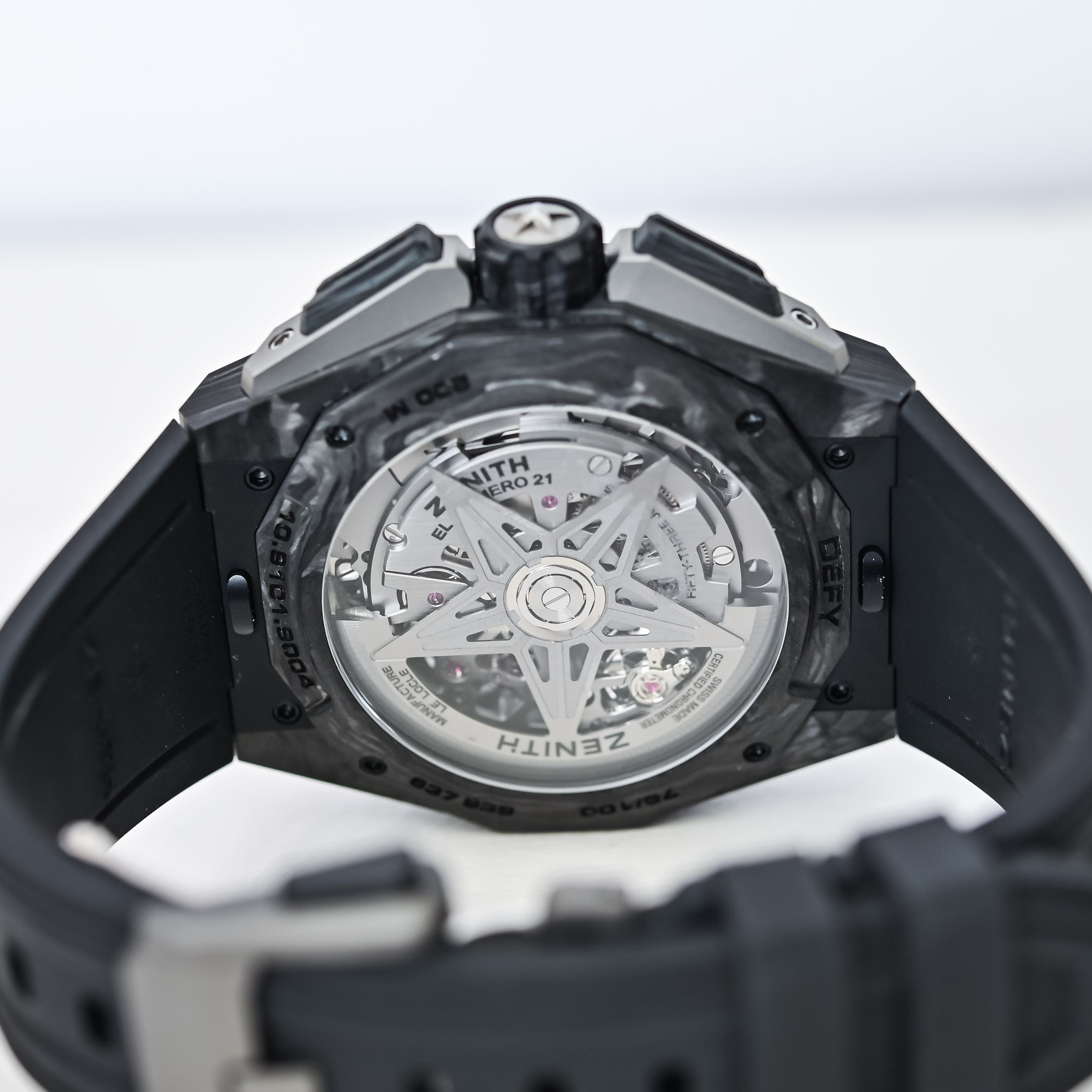 Caseback of the Defy Extreme Lapis Lazuli II, the El Primero star-shaped rotor over the open movement under a sapphire crystal engraved DEFY and 200 M