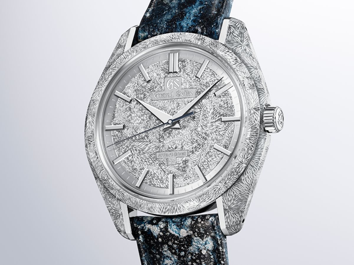 Grand Seiko SBGZ011 shown head-on on the KYOTO leather strap, its black, blue and silver splash finish echoing the engraved silver dial and platinum case