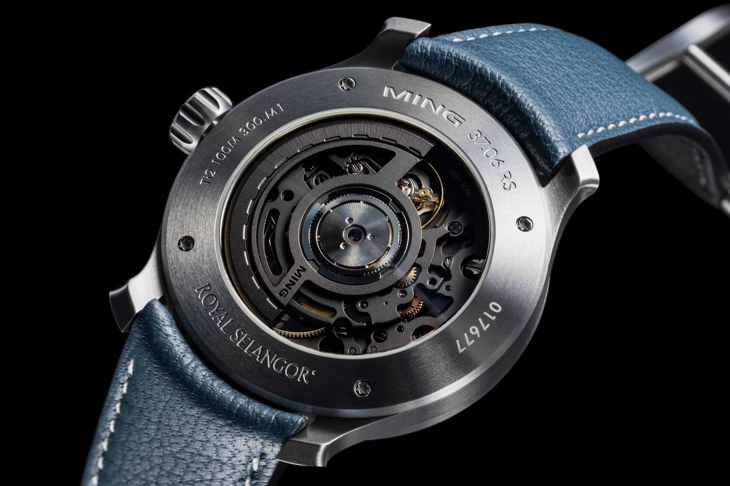 Exhibition caseback of the MING 37.06 Royal Selangor engraved MING 37.06 RS and Royal Selangor, numbered 017677, over the open-worked rhodium-plated SW300.M1 movement