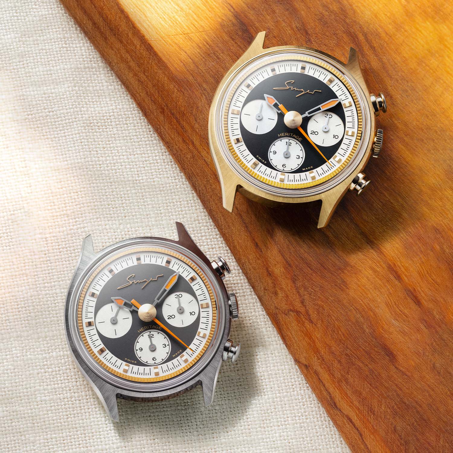 The Singer Heritage V72 in yellow gold with a black dial and in steel with a stone-grey dial, both showing the tricompax Valjoux 72 layout with a 30-minute counter at 3, a 12-hour counter at 6 and running seconds at 9