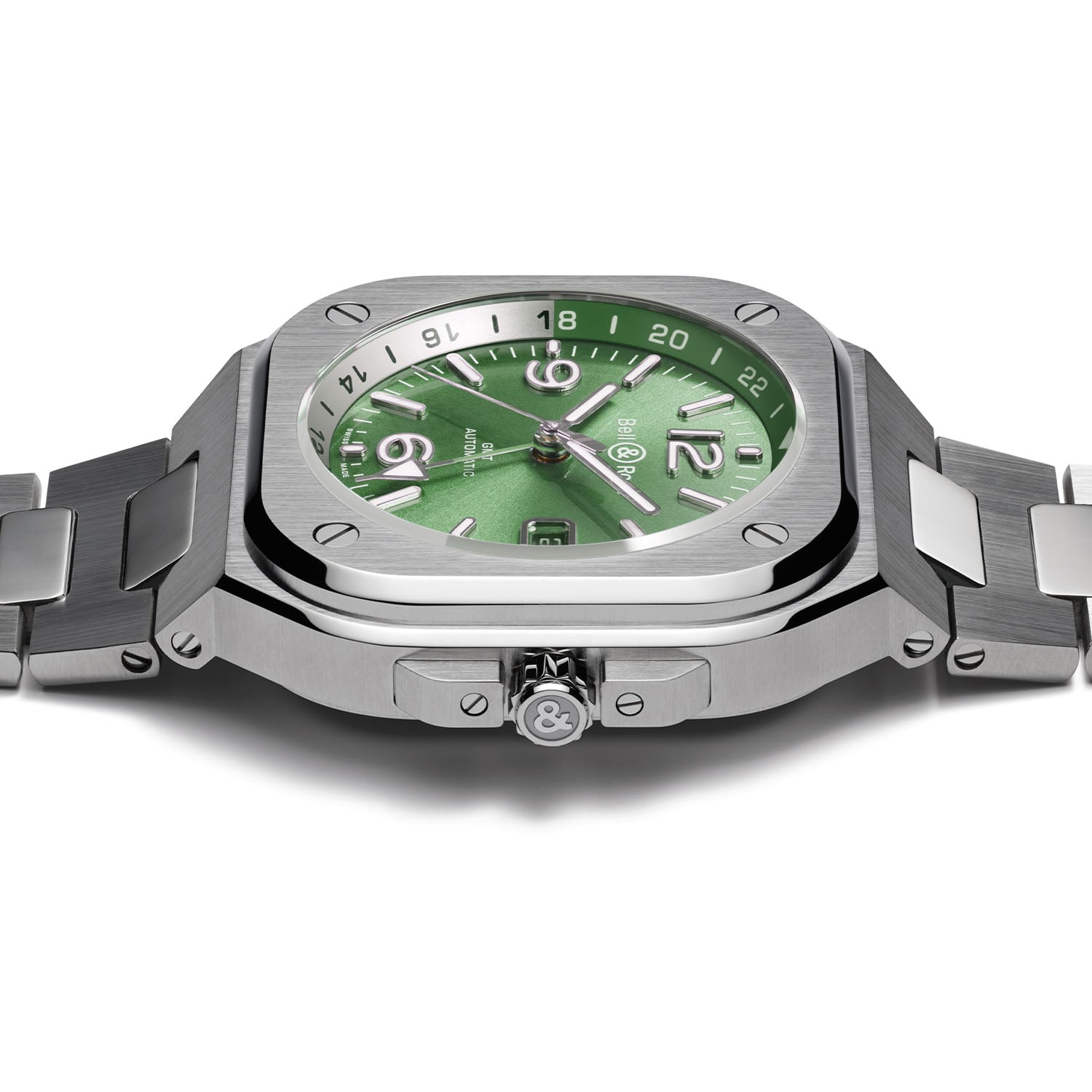 Side profile of the BR-05 GMT Green Steel in steel, showing the slim case flank and the screw-down crown engraved with the Bell & Ross ampersand