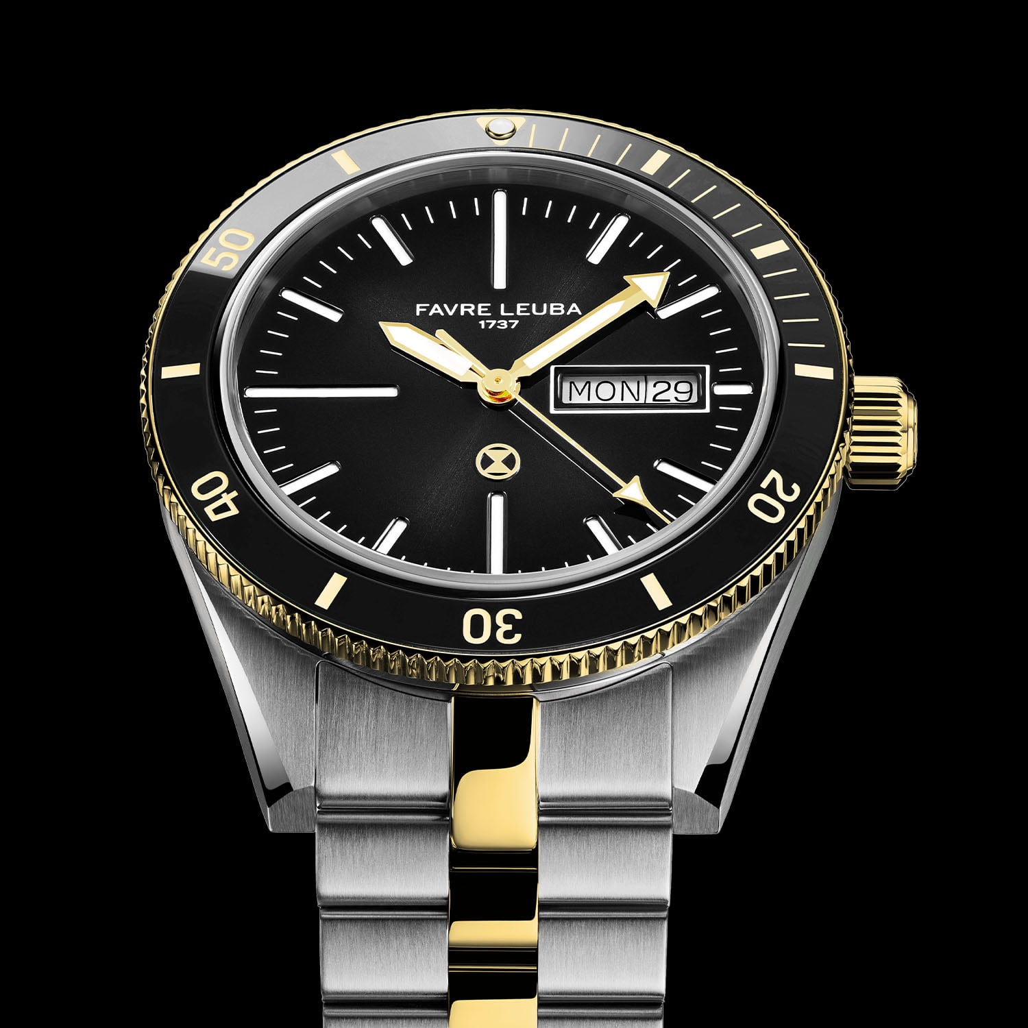 Favre Leuba Deep Raider Day Date with a black dial, gold-edged fluted bezel over a black ceramic insert and a gold crown, on its integrated two-tone steel and gold bracelet