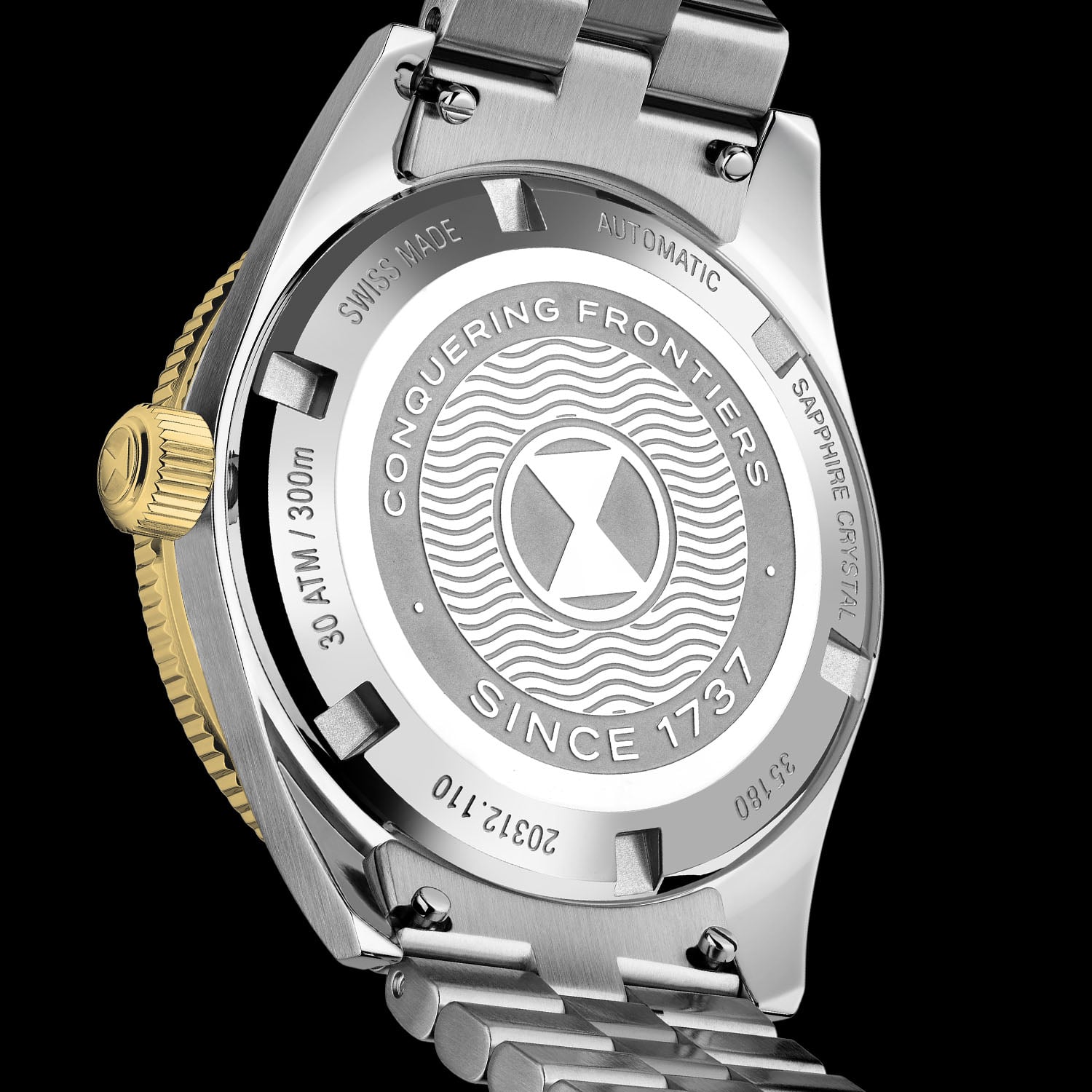 Steel screw-down caseback of the Deep Raider Day Date engraved Conquering Frontiers since 1737 with the hourglass emblem, a wave pattern, 30 ATM 300m and reference 20312.110