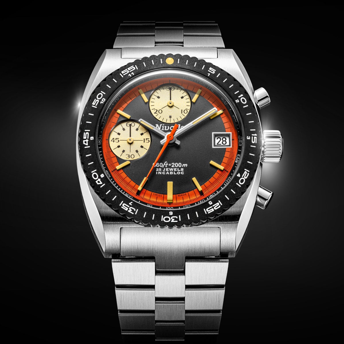 Front view of the Nivada Grenchen Autochron Automatic Orange on its steel bracelet, showing the grained black dial, orange minute ring, twin beige subdials and orange chronograph seconds hand under a domed crystal