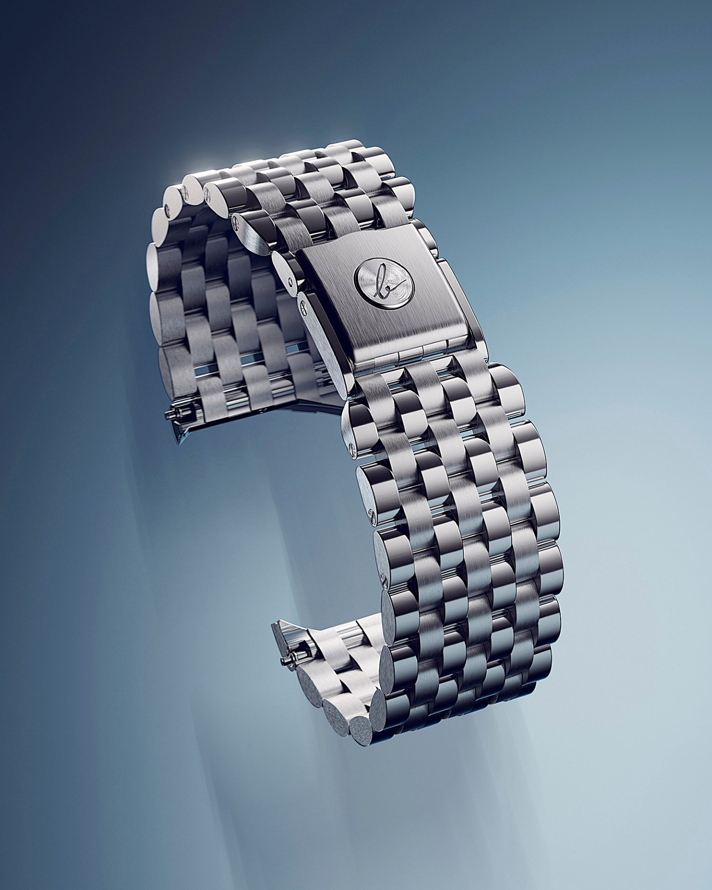 The Mirage Miroir bracelet in white metal, an articulated multi-row band tapering into a folding clasp engraved with the cursive Berneron b