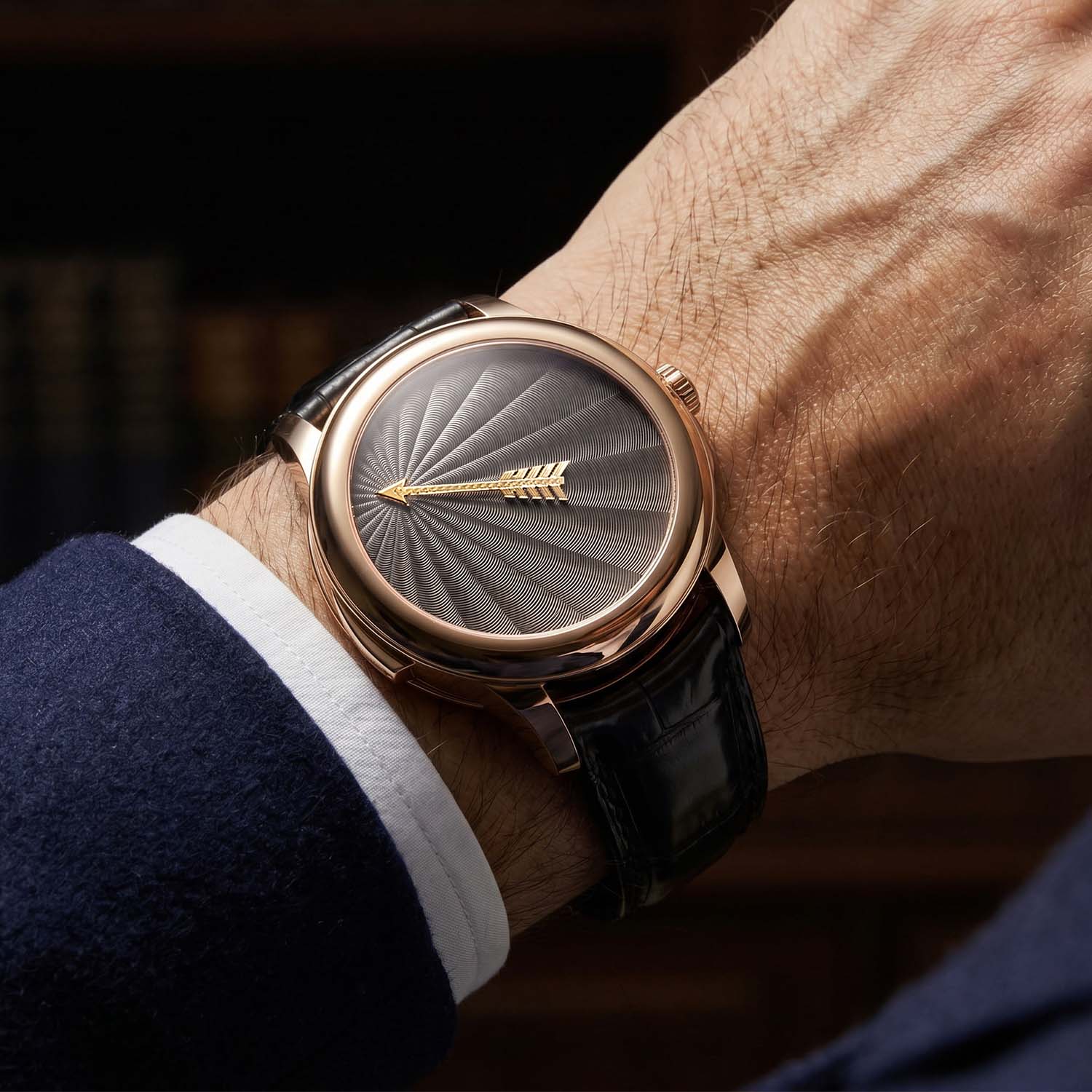 The red gold L.Leroy Vox Temporis on the wrist, grey soleil dial and gold arrow hand on a black alligator strap