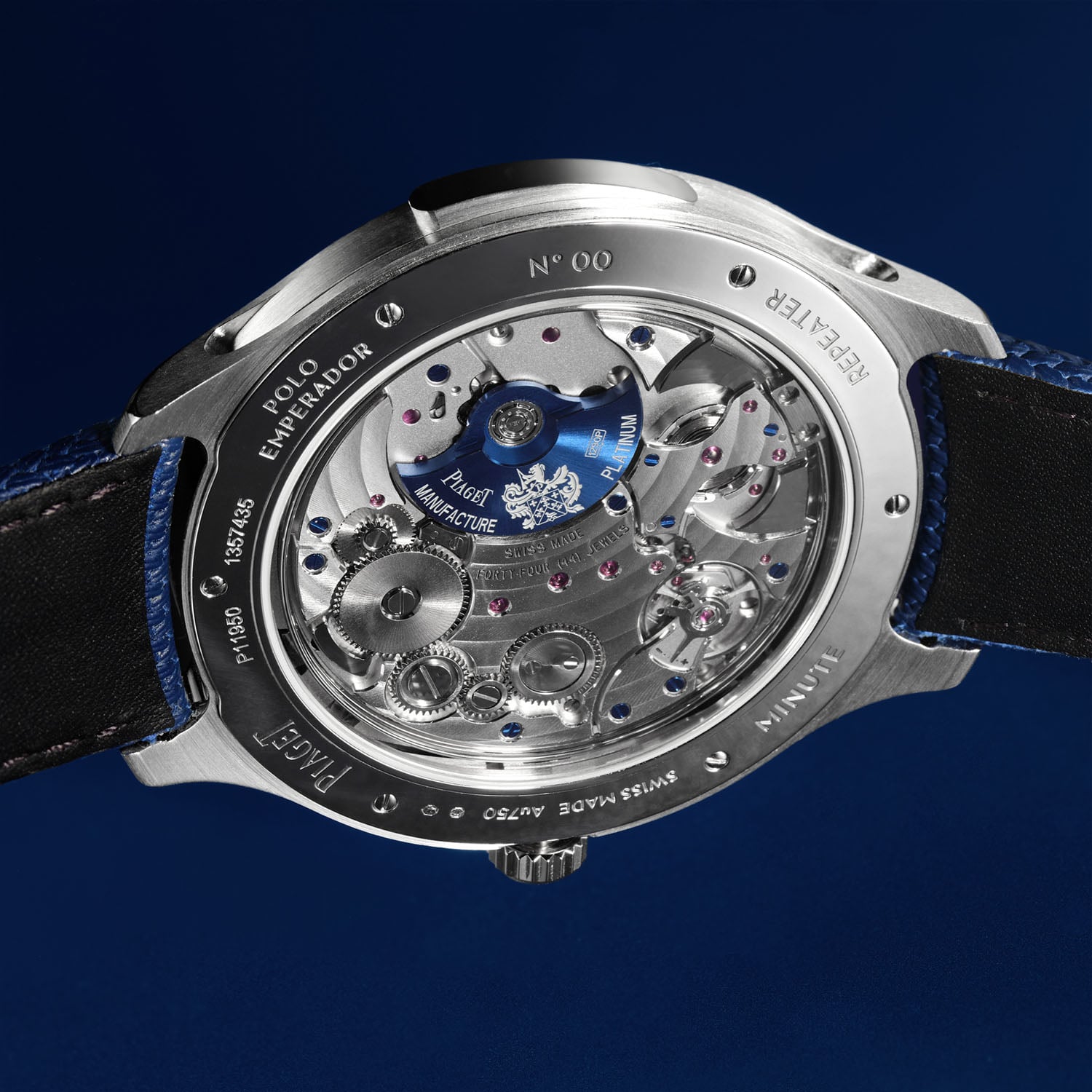 The sapphire caseback of the Piaget Polo Minute Repeater showing calibre 1290P with its blue platinum micro-rotor, engraved Polo Emperador, Repeater and Minute around the case ring