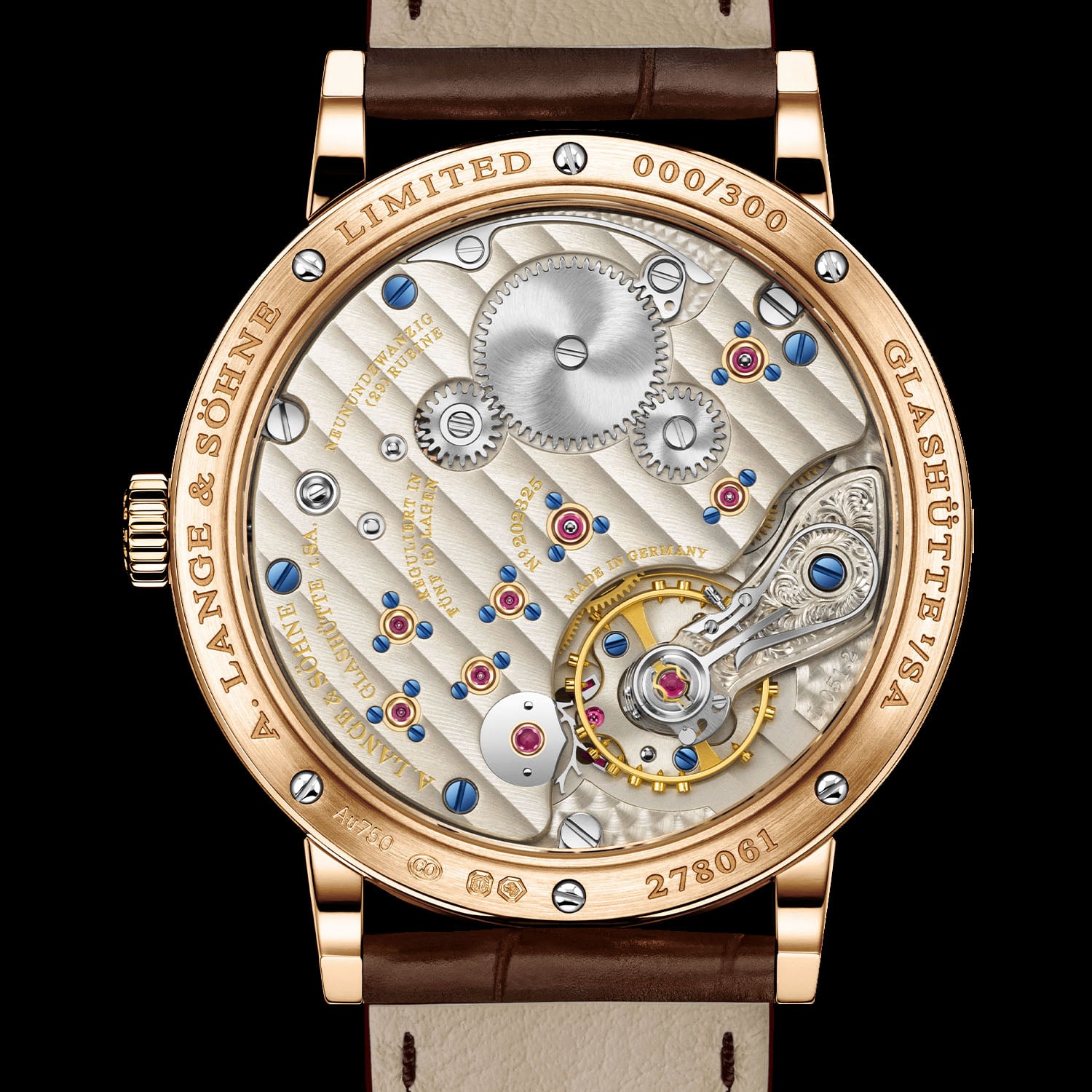 The sapphire caseback of the pink gold 1815 Up/Down engraved LIMITED 000/300, revealing the hand-wound calibre L051.2 with its German silver three-quarter plate, Glashütte ribbing, hand-engraved balance cock and gold chatons