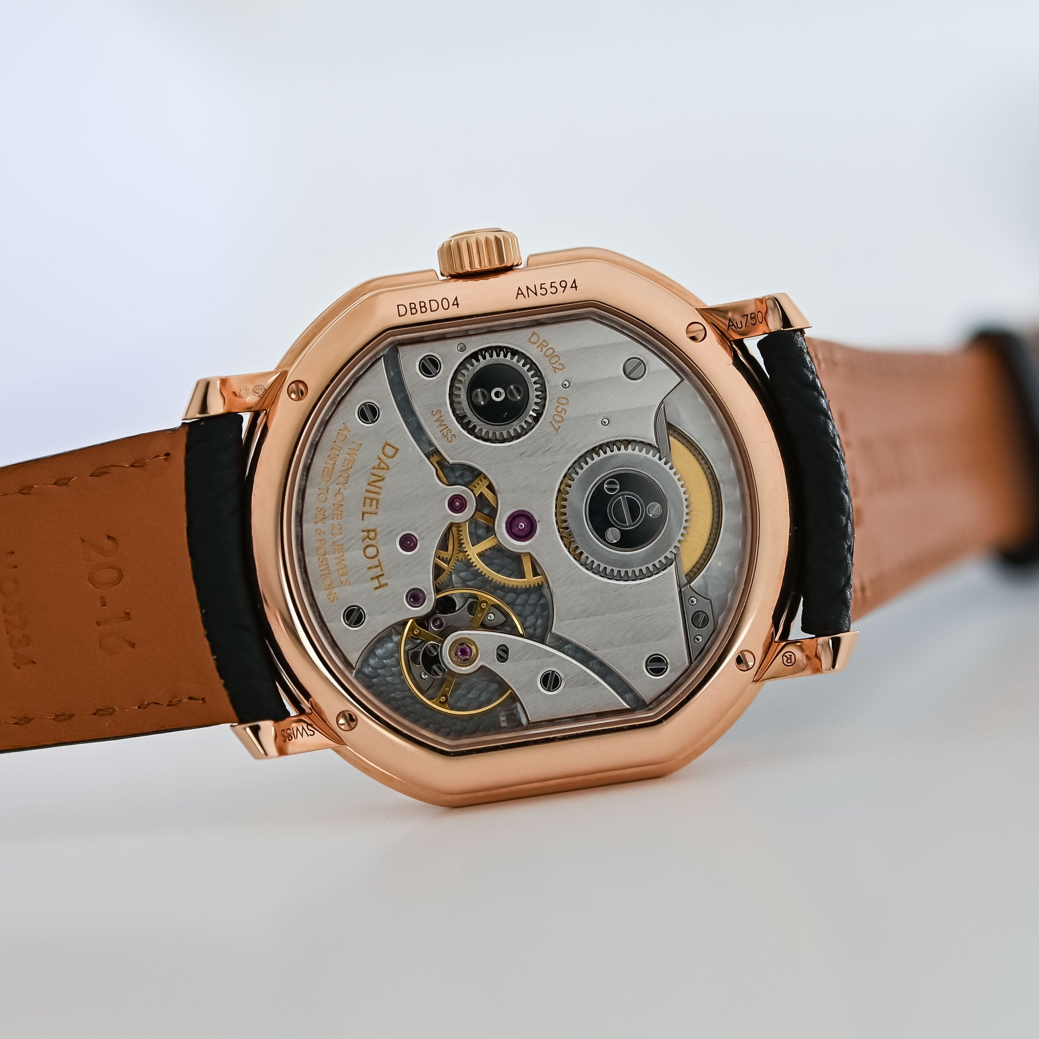 Caseback of the Extra Plat showing the hand-wound calibre DR002 through sapphire, engraved DANIEL ROTH, twenty-one 21 jewels adjusted to six positions, with striped bridges and a frosted plate