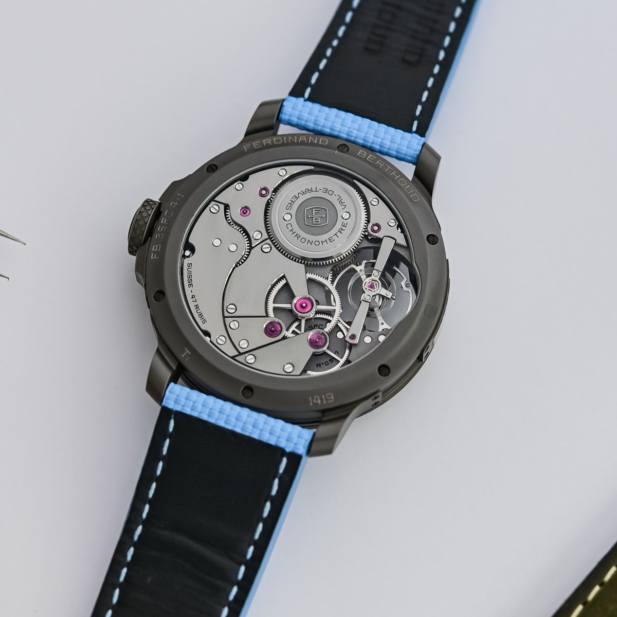 The exhibition caseback of the FB 3SPC.4-1 showing the hand-wound Calibre FB-SPC engraved Ferdinand Berthoud, Val-de-Travers and Chronometre, in a black ceramised titanium case