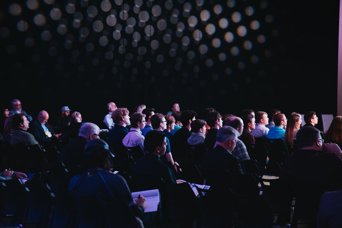 Audience at a luxury industry event, representing Watches and Wonders 2026
