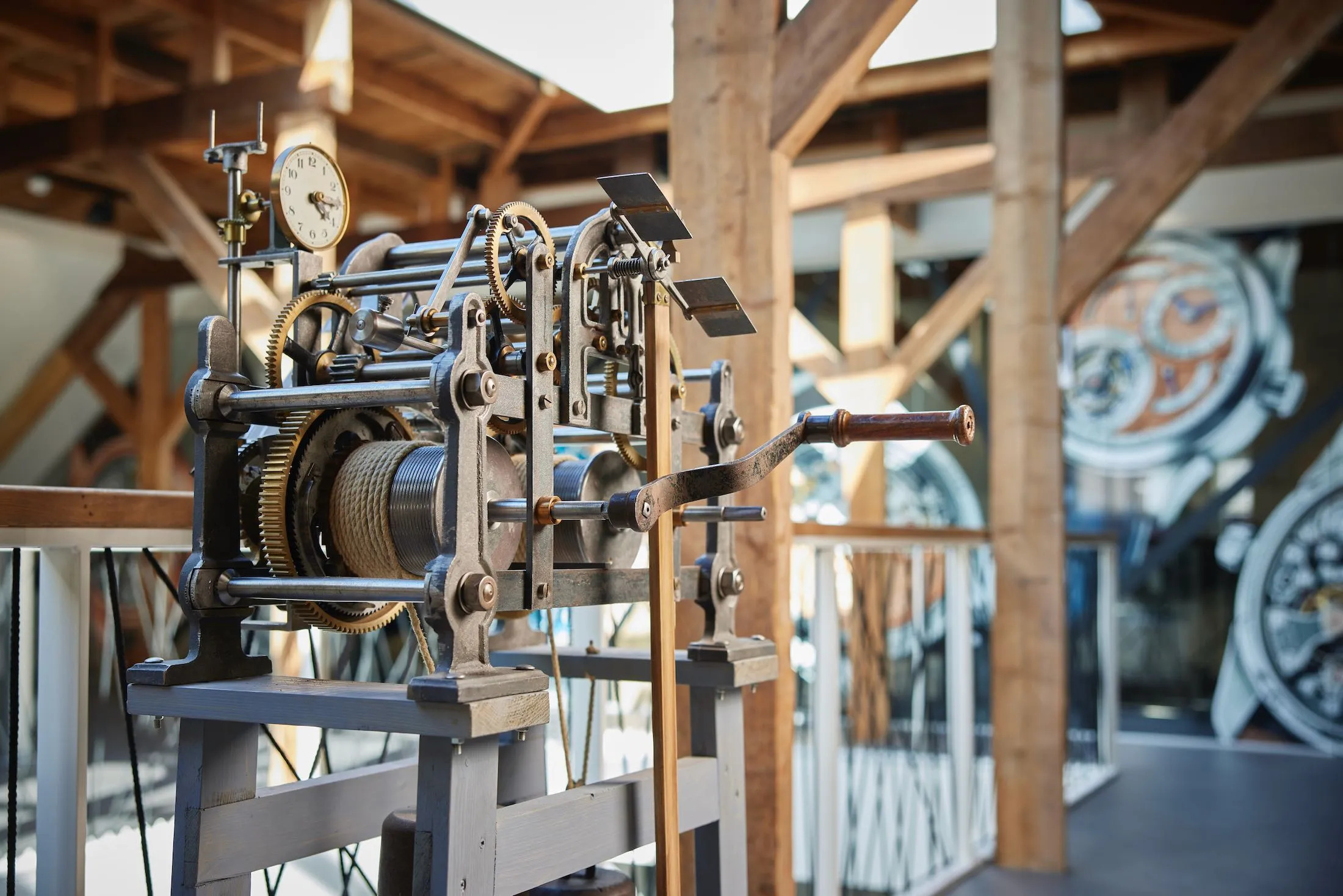 The historical clock mechanism from the Grönefeld atelier, a direct link to the family's origins maintaining the Sint Plechelmus basilica clock